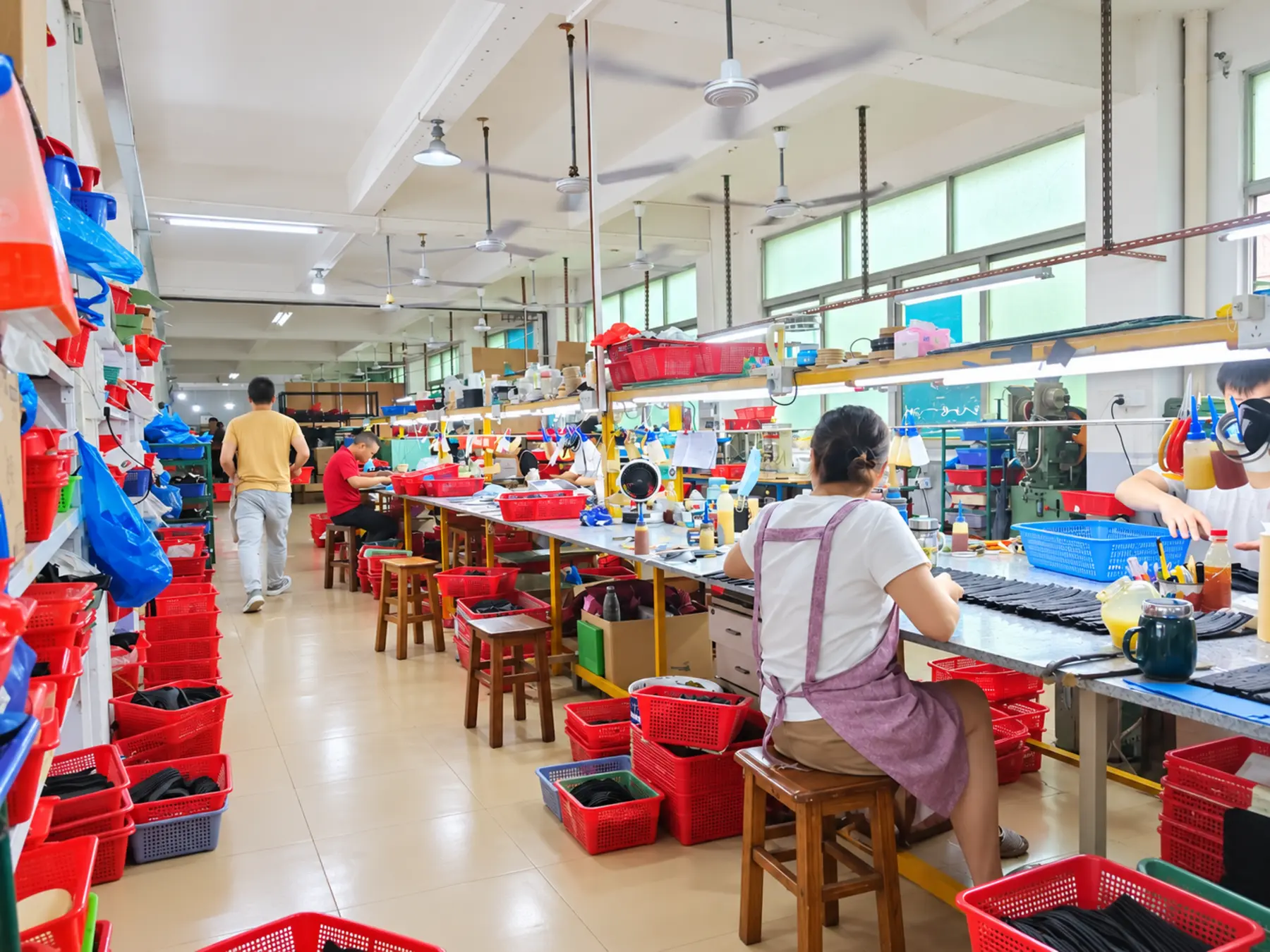 Qineng workshop with footwear makers at work